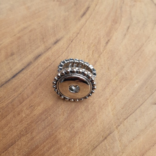 Bague pression fleur élastique